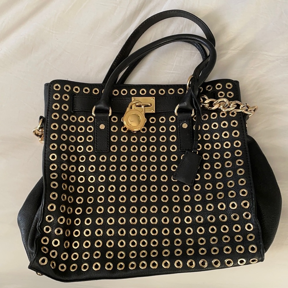 Michael Kors black and gold handbag